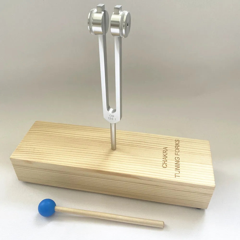 Aluminium alloy 432Hz tuning fork and speaker set on kraft paper box