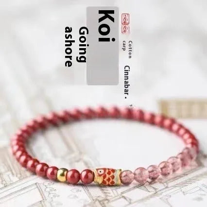 Women's retro bracelet with purple cinnabar and pink strawberry quartz beads on a wrist.