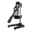 Cast iron manual citrus juicer with stainless steel strainer in black or white finish