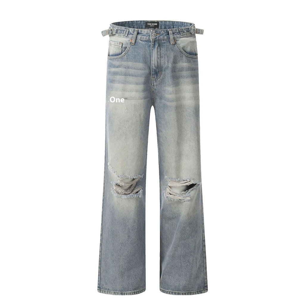Blue men's straight-leg ripped jeans on a neutral background, showing the cotton blend fabric and zipper fly detail.