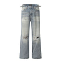 Blue men's straight-leg ripped jeans on a neutral background, showing the cotton blend fabric and zipper fly detail.