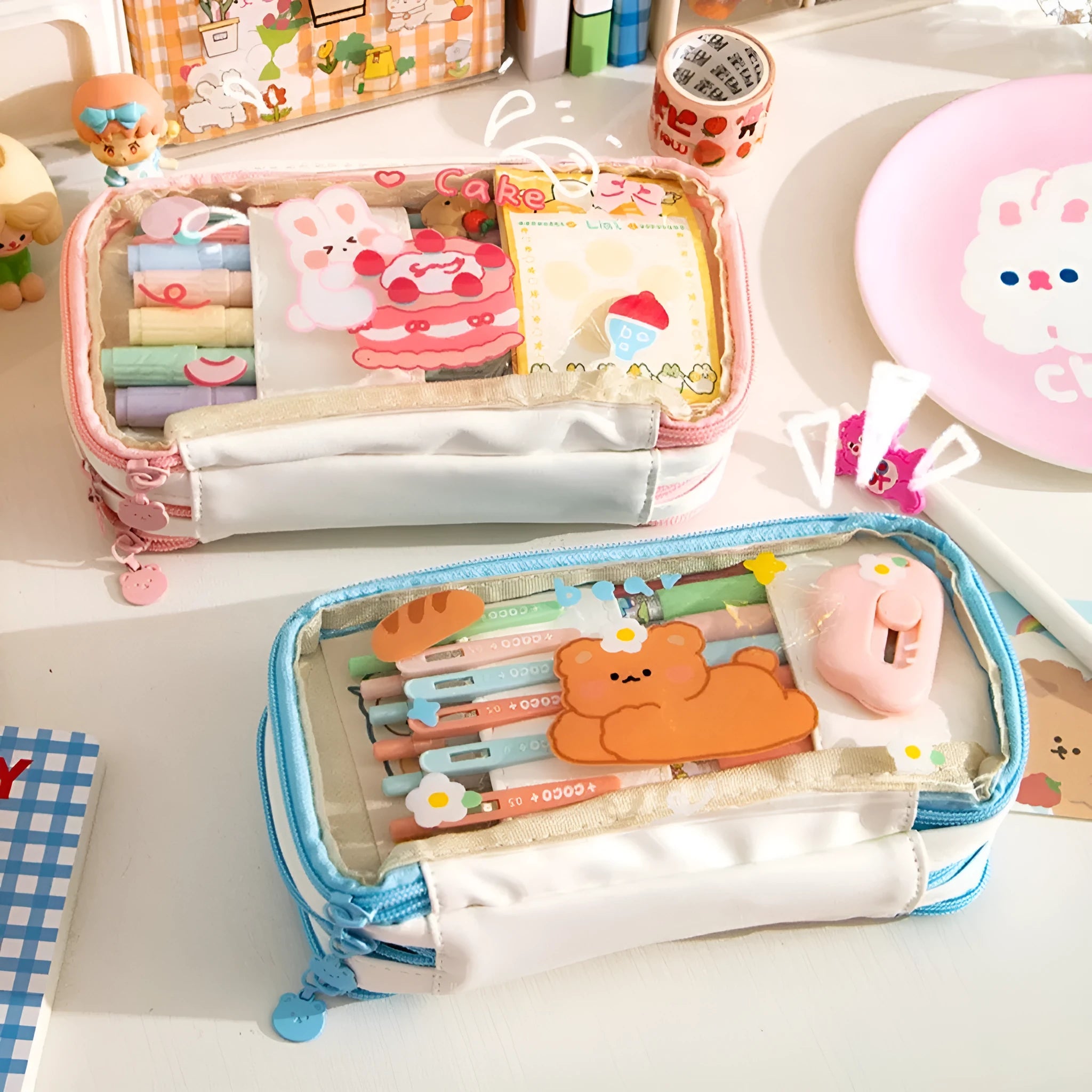 Transparent TPU pencil case with Korean-style pink rabbit design showing visible pens inside