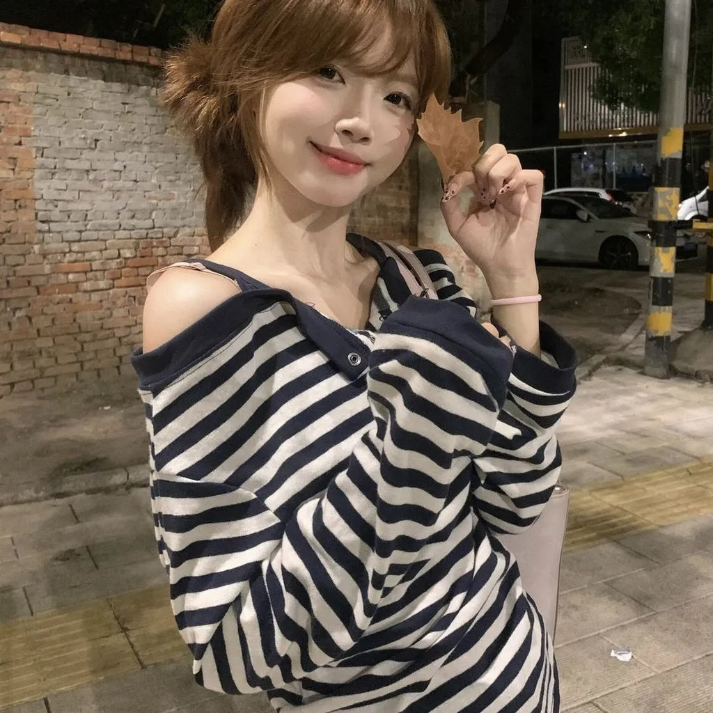 Dark blue striped women's oversized t-shirt with embroidery and button details