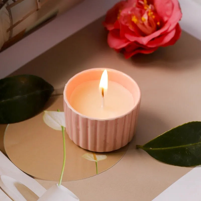 Soy aromatherapy candle in a white ceramic cup with floral scents for bedroom use