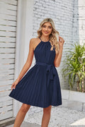 Women's black halter neck strapless dress with pleated chiffon skirt and adjustable waist belt