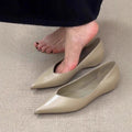 French minimalist pointed toe flat pumps with height increasing insole, solid colour, flanging details