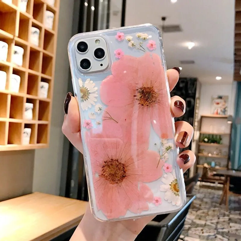 Floral TPU phone case for iPhone showing large pink flower design on a smartphone back cover.