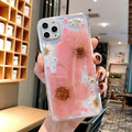 Floral TPU phone case for iPhone showing large pink flower design on a smartphone back cover.
