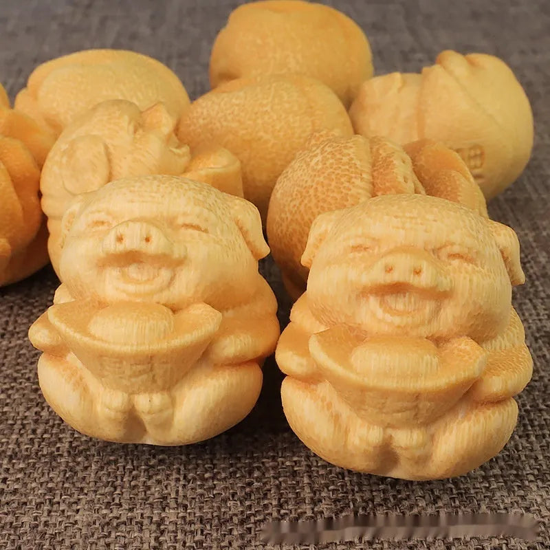 Solid bamboo carving cute ingot pig ornament, 4cm tall.