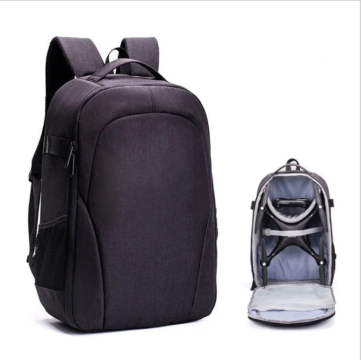Black waterproof Oxford cloth drone backpack with multiple internal compartments for camera and laptop storage