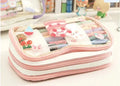 Transparent TPU pencil case with Korean-style pink rabbit design showing visible pens inside