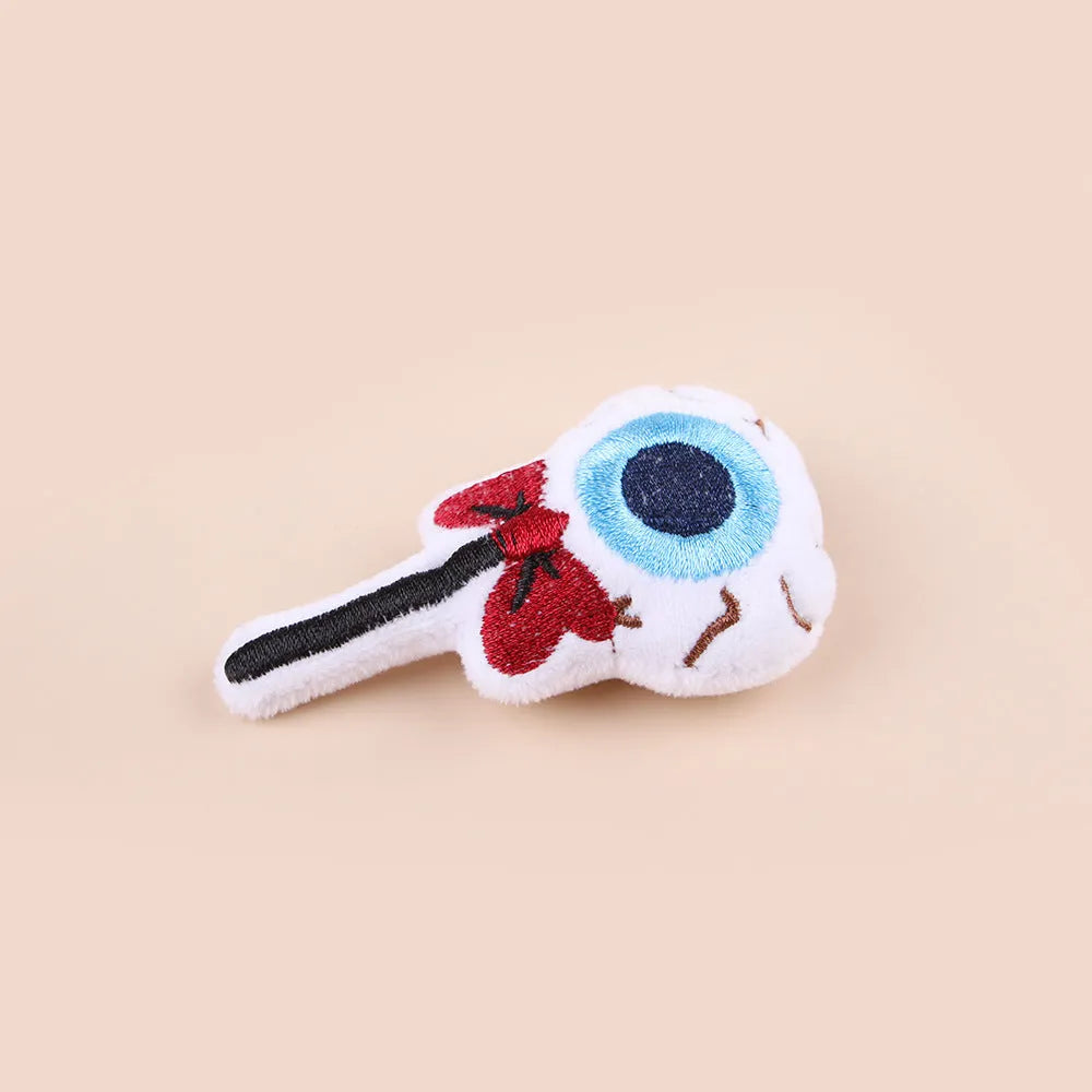 Small plush cat teaser toy with colourful candy or skull design on string