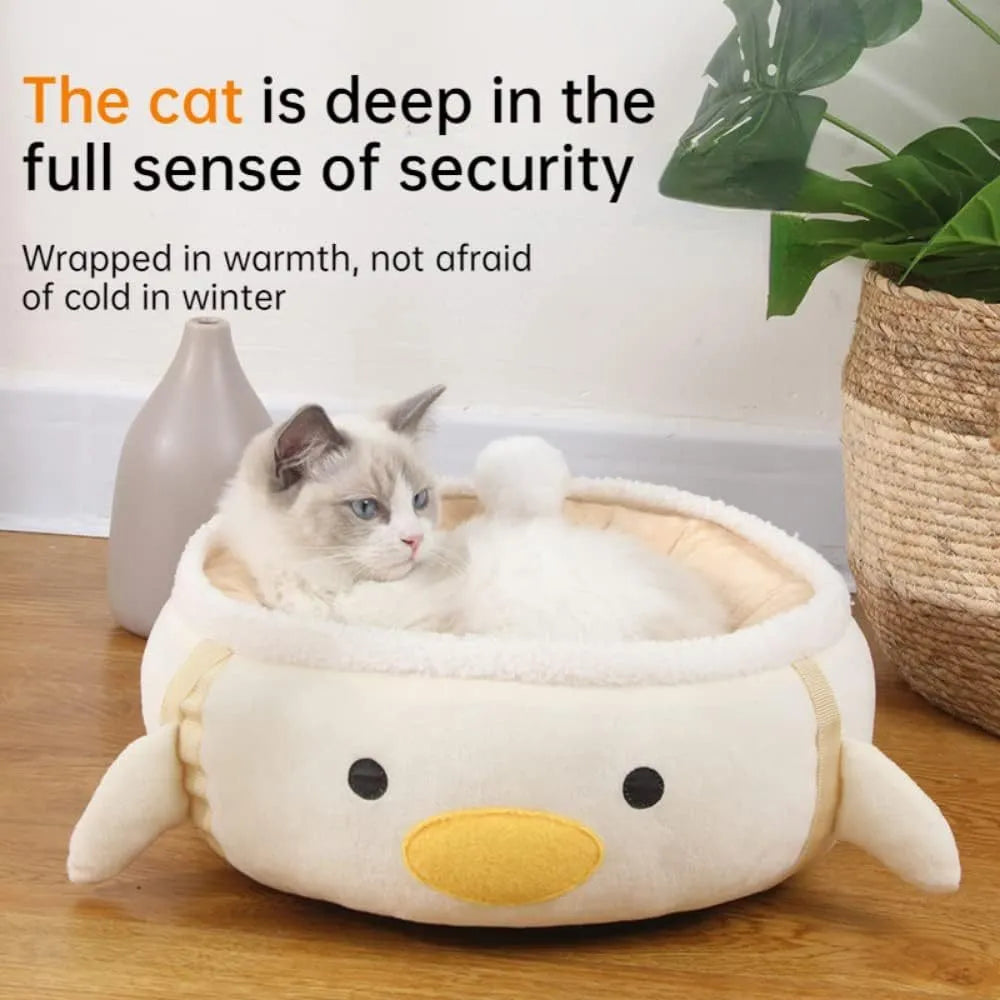 Green dinosaur-shaped cat bed shown both flat and hanging as a hammock for small cats.