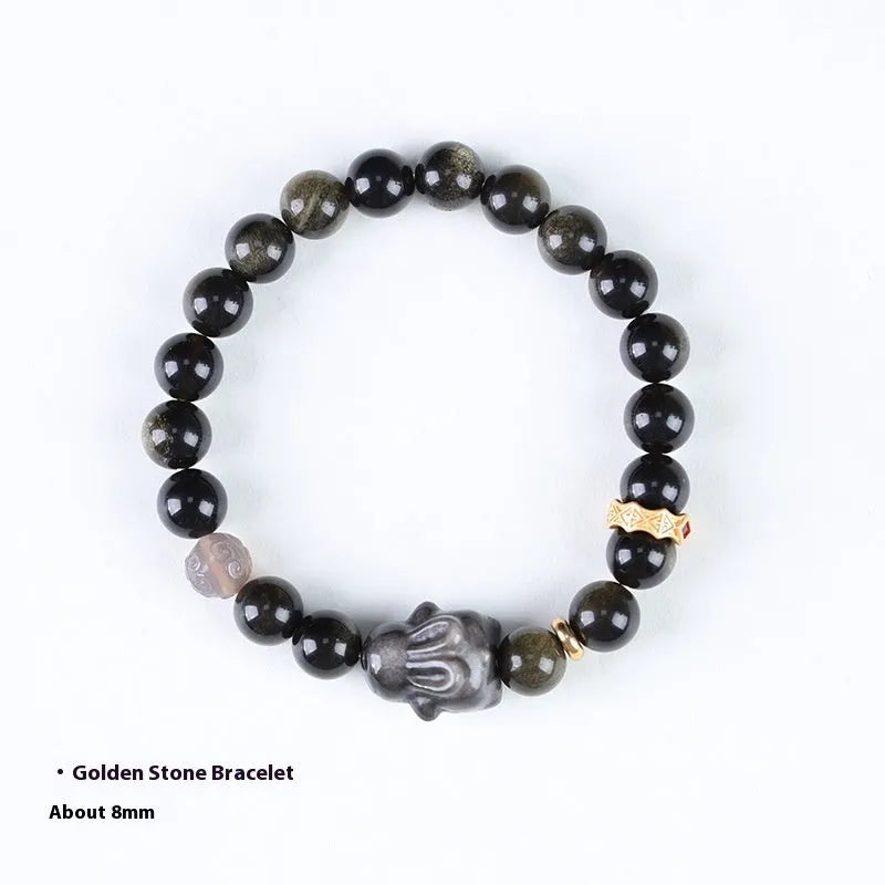 Handmade lying rabbit obsidian bracelet with Jin Yaoshi beads and brass details in national style.