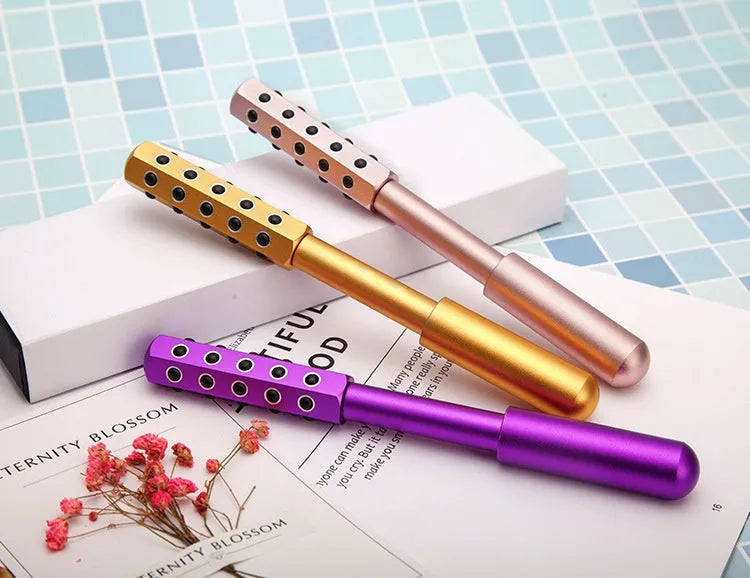 Purple germanium particle facial massage roller with 24 beads for manual skincare