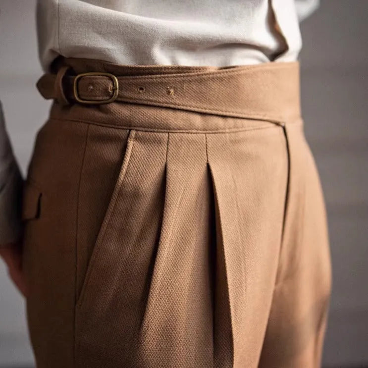 Man wearing black high-waist straight-leg casual polyester trousers for leisure.