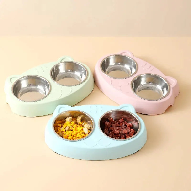 Blue macaron-shaped plastic pet feeder with two bowls for cat or dog food and water