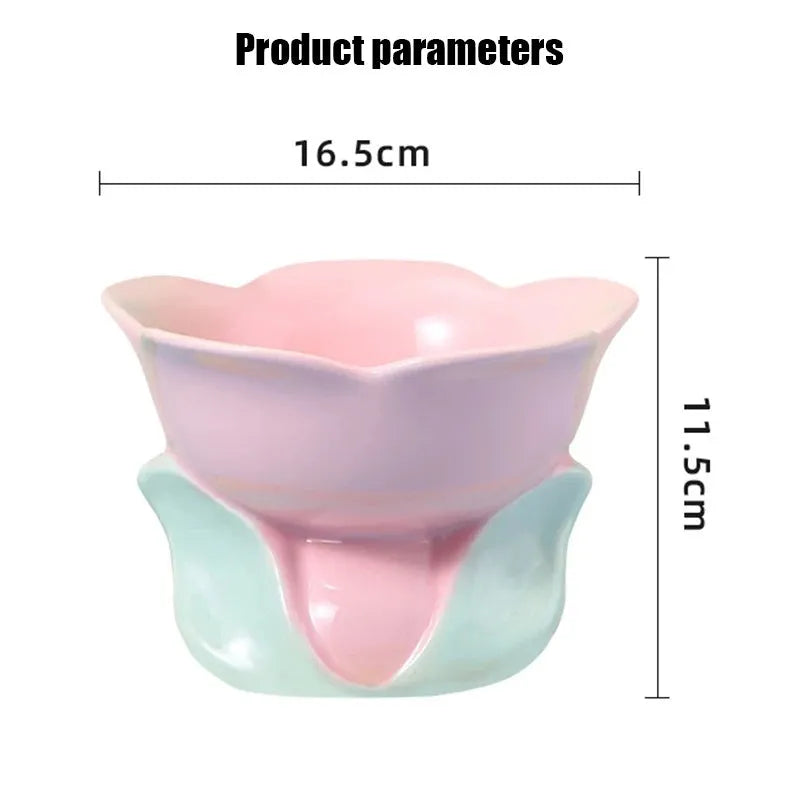 Blue ceramic raised pet bowl with floral pattern and non-slip base for cats or small dogs.