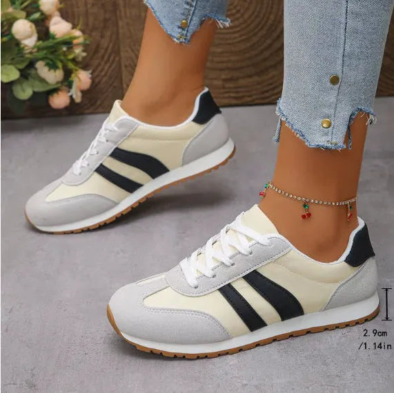 Blue and grey Cortez stripes leisure sports shoes with rubber sole and round toe.