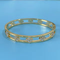 Gold and silver buckle options of hollow women's bracelet with four-leaf clover inlaid zircon design