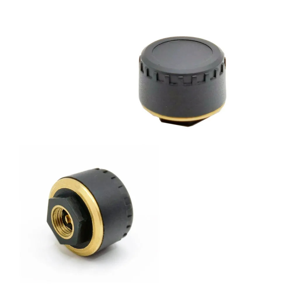 Four black Bluetooth tyre pressure sensors for mobile phone monitoring display