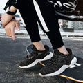 Student running shoes with mesh fabric upper, front strap closure, and low-top design in multiple colour options