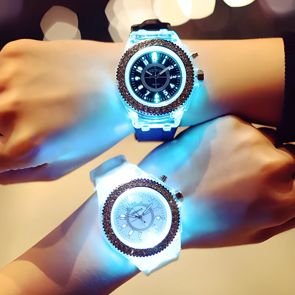 Women's LED luminous watch with round alloy case and colourful silicone strap.