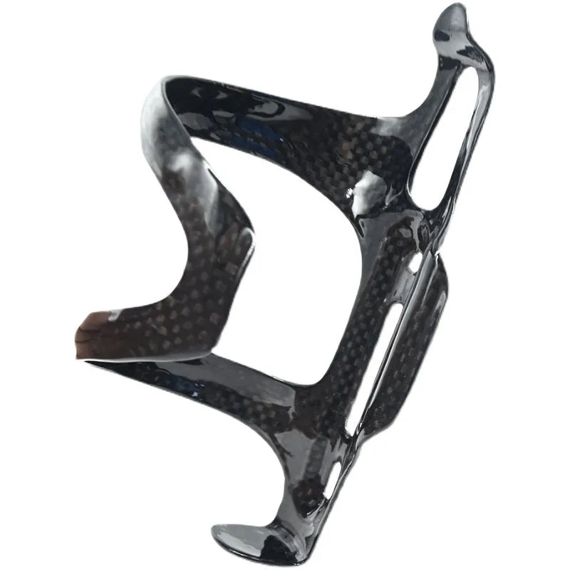Black carbon fibre side pull bicycle water bottle cage showing mounting holes and bottle retention mechanism