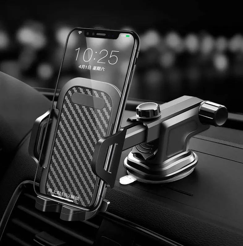 Black car phone holder for smartphones between 4 and 7 inches on a car dashboard