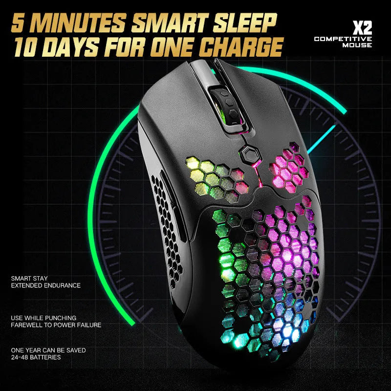 Free Wolf X2 wireless RGB gaming mouse with honeycomb shell in various colours on a desk.
