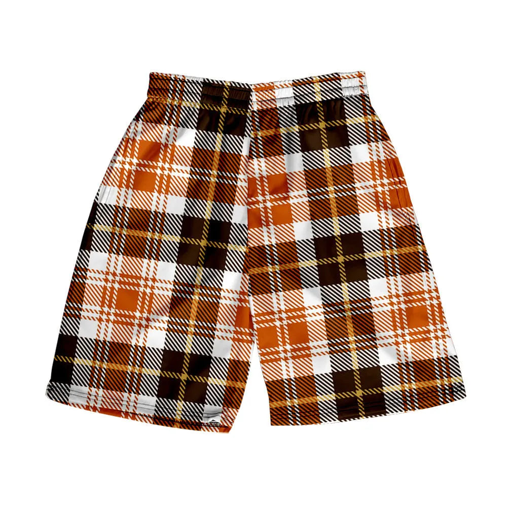 Man wearing casual plaid polyester shorts with an elastic waistband, shown in a straight-leg shorts style.