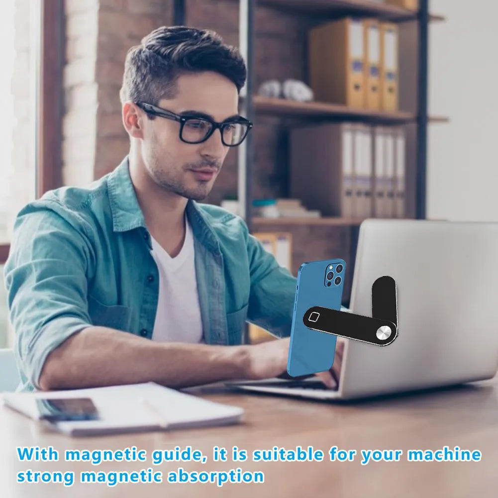 Black aluminium laptop phone holder with magnetic mount attached to monitor