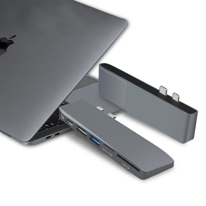 8-in-1 USB-C conversion hub with dual plugs for MacBook Pro laptops showing eight output ports