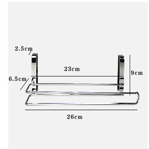 Silver stainless steel paper towel rack hanging on kitchen cabinet door