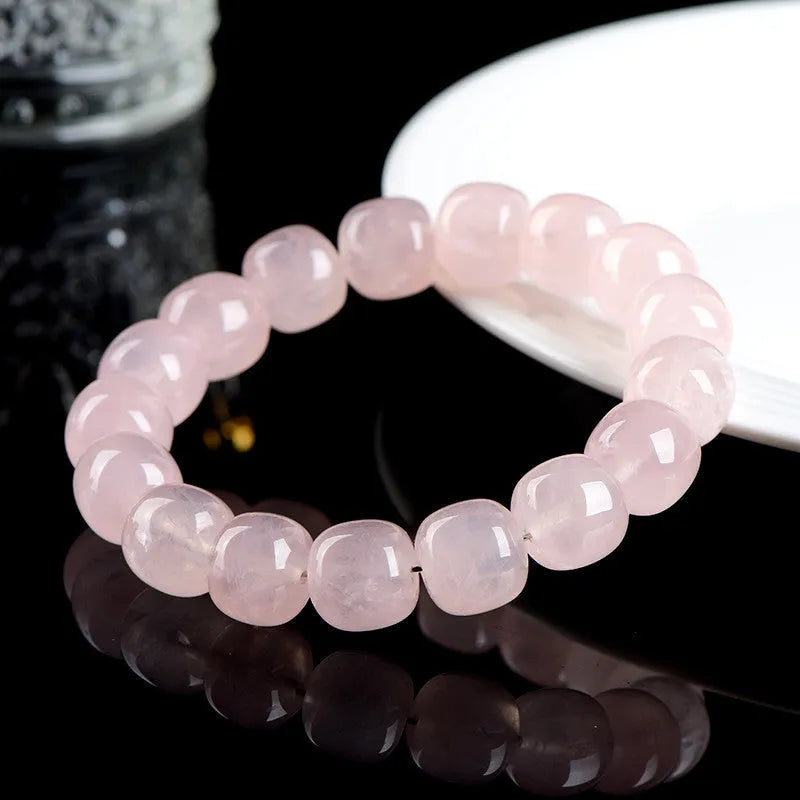 Pink crystal and natural bamboo bracelet with 11x12mm barrel-shaped geometry beads