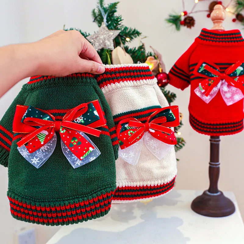 Red Christmas sweater for a small dog on a festive background, showing the 'Merry Christmas' print and pullover style.
