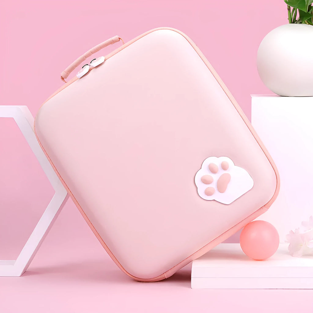 Nintendo Switch storage bag with cat claw design and shoulder strap holding game cartridges