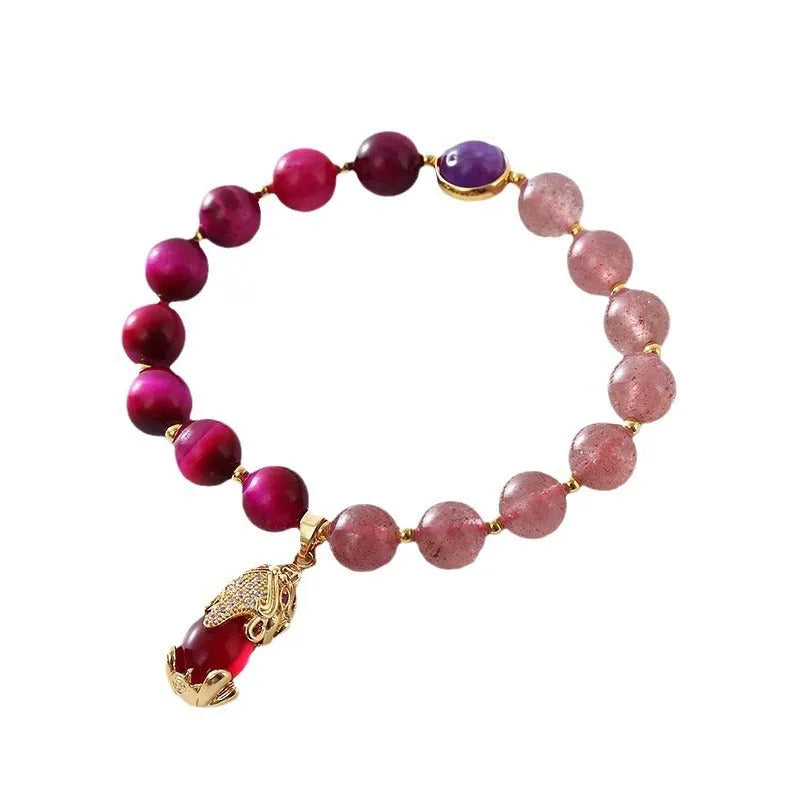 Simple strawberry crystal bracelet for women with elastic band, showing natural stone detail.