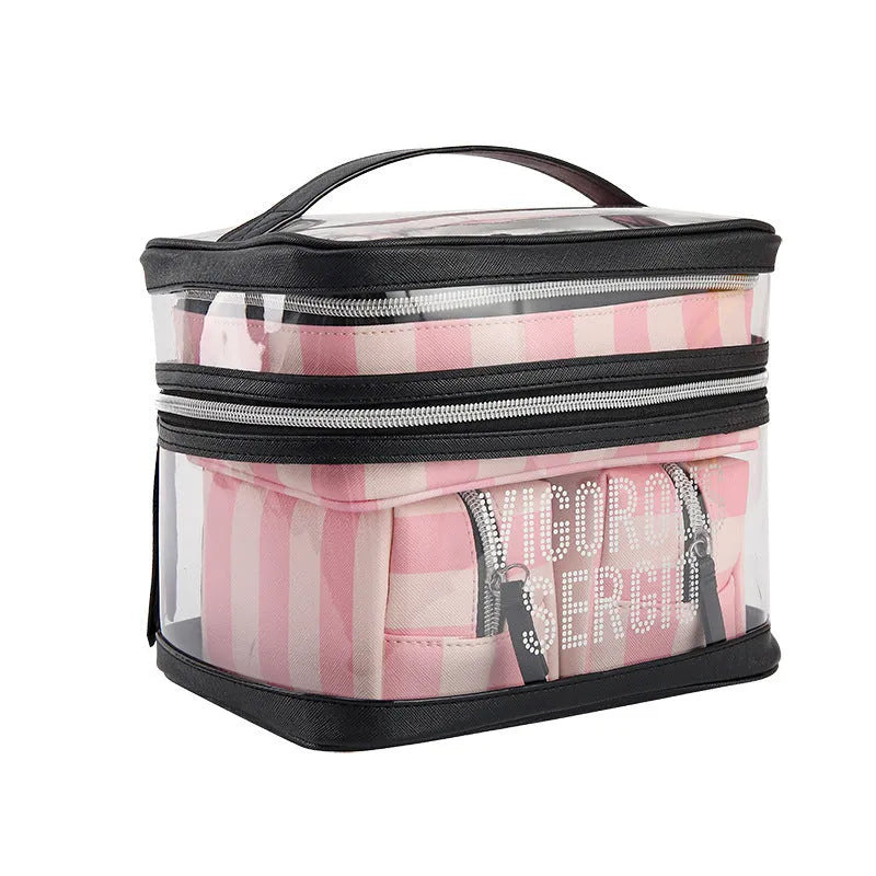 Pink and white striped folding makeup bag with floral pattern and synthetic leather material.
