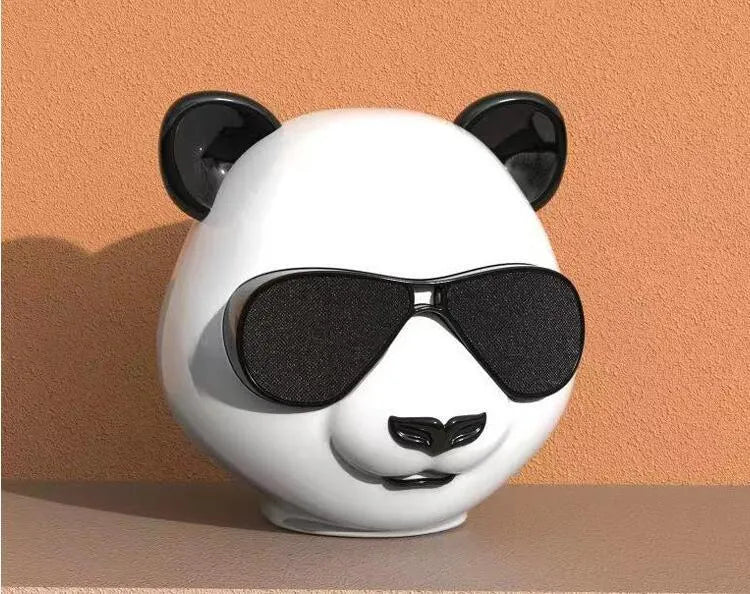 Portable mini Bluetooth speaker in classic style with USB port.