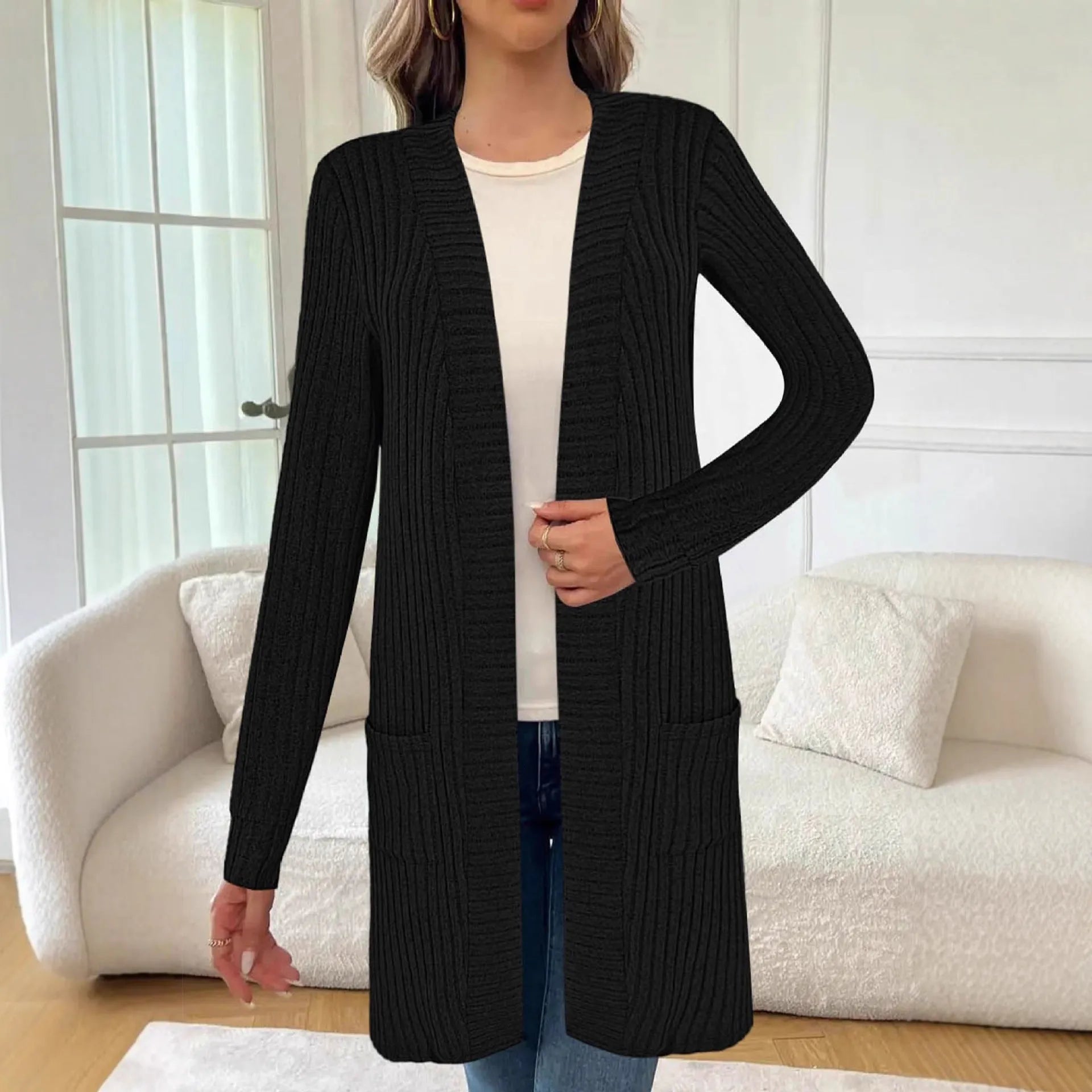 A loose-fitting long sleeve knitted cardigan jacket with pockets, shown in black, wine red, and grey colours.