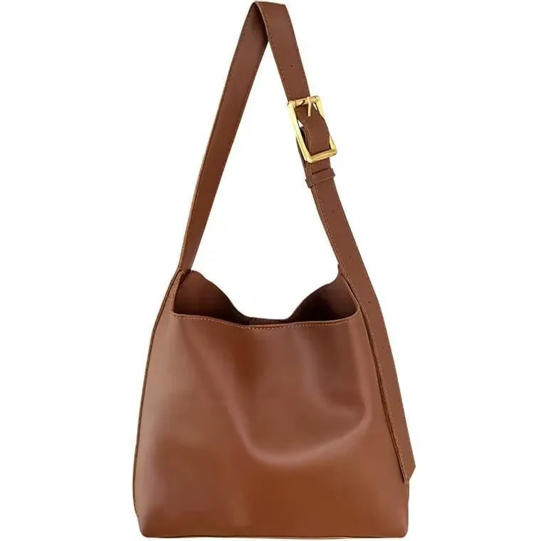 Women's soft PU leather shoulder bag with swing threads detail in black and brown colour options