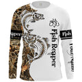 Men's grey pullover with a printed all-over fish pattern, round neck, and long sleeves.