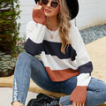 Women's short striped pullover sweater in loose fit with regular sleeves