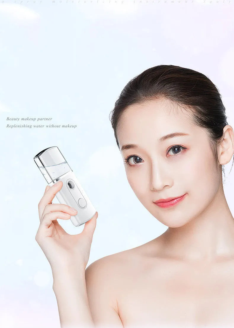 Portable facial nano mist humidifier in white with 20ml tank and compact 10cm body