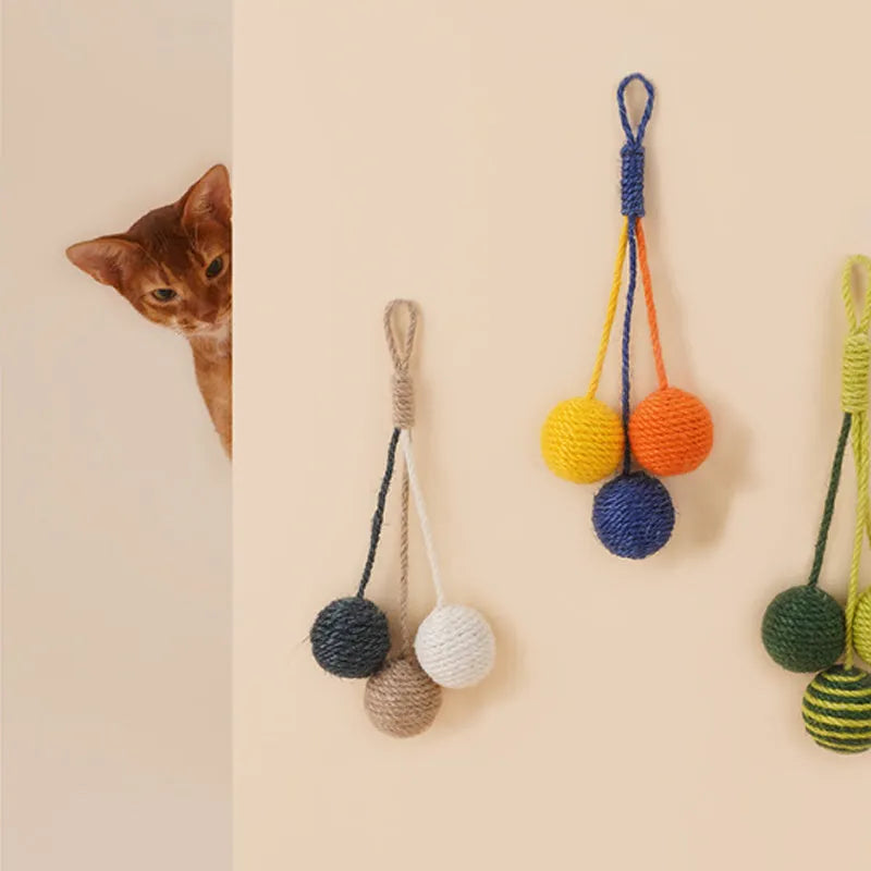 Cat teaser wand with catnip ball and feather toys in multiple colours including blue, green, red, yellow