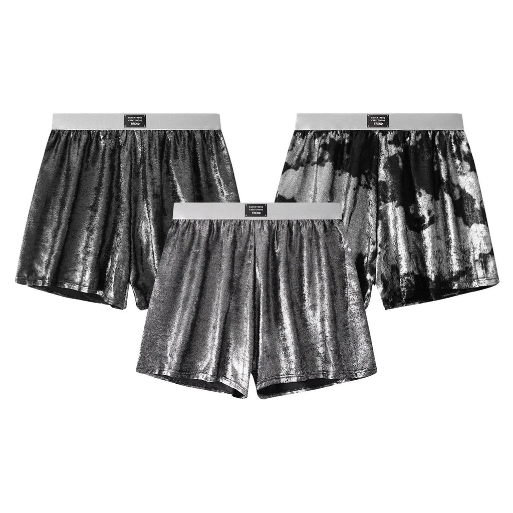 Galaxy brand men's reflective silver loose sports underwear on a mid-waist model.