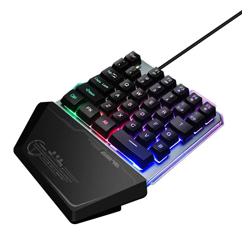 G40 black one-handed mechanical keyboard with RGB backlit keys on a desk.