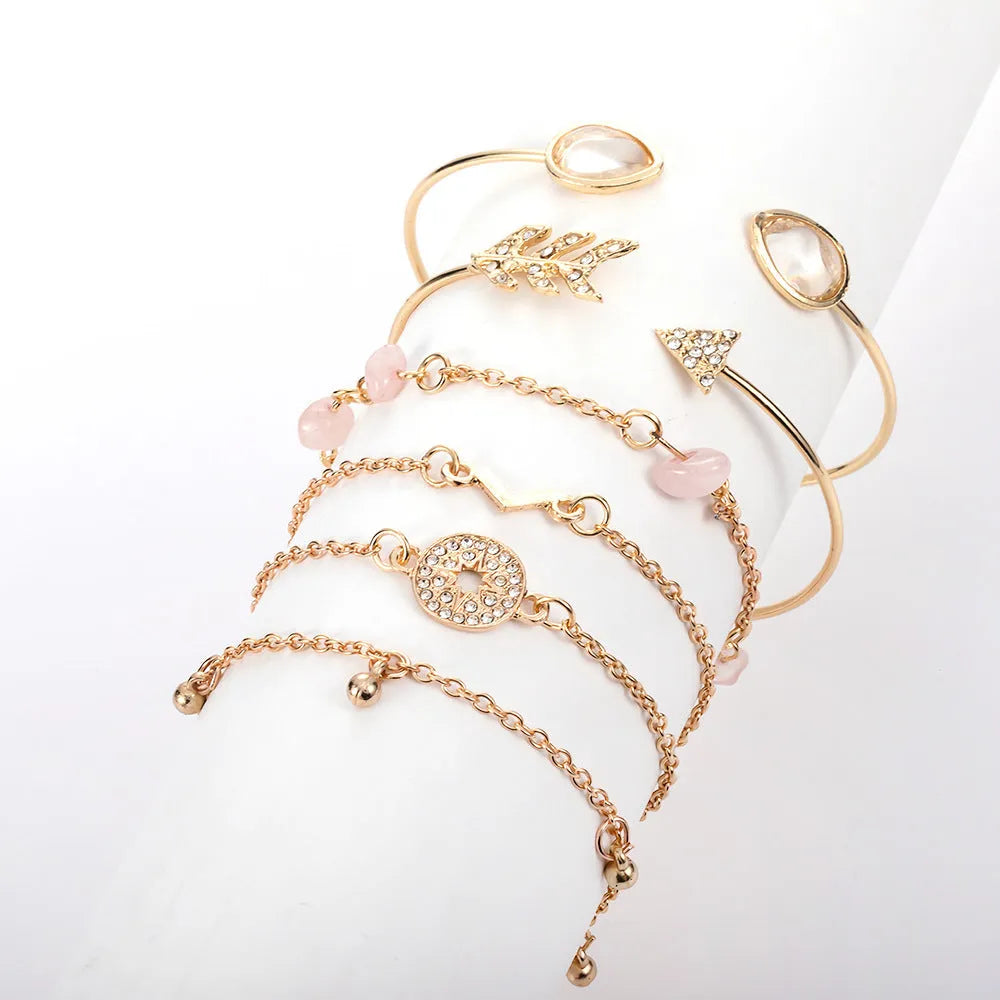 Women's gold jewellery bracelet set with arrow and water drop shapes on zinc alloy