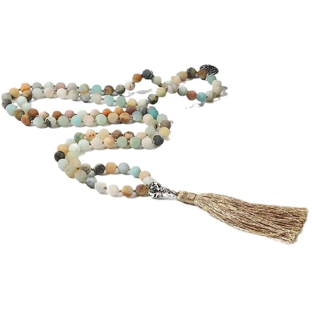 Handmade long beaded necklace with 108 natural stone pendants on a knotted cord.